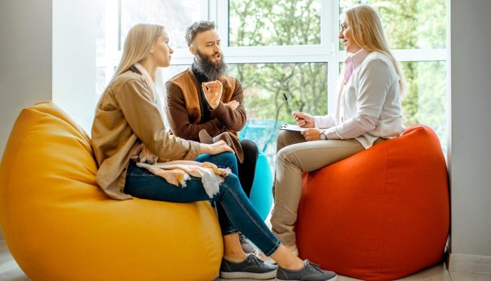 young-couple-during-the-psychological-counseling-with-psychologist-1-e1656652763234.jpg